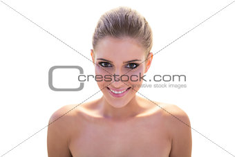 Bare smiling blonde model looking at camera