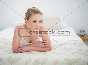 Natural content blonde lying on bed