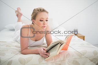Natural content blonde reading a book