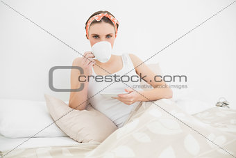 Pretty woman drinking a cup of tea