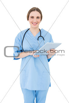 Female doctor pointing at a tablet