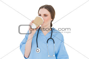 Female doctor drinking coffee