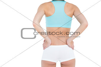 Rear view of slender woman wearing sportswear