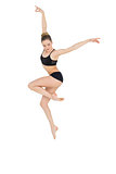 Elegant slim ballet dancer jumping in the air