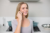 Cheerful gorgeous model phoning