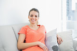 Content casual woman relaxing sitting on couch