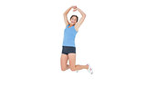 Sporty woman jumping over white background