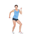 Active woman dancing over white background