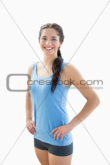Portrait of a slim smiling woman in sportswear