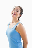 Portrait of a cheerful woman in blue tank top