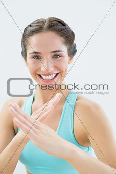 Close up portrait of a fit woman in defending posture