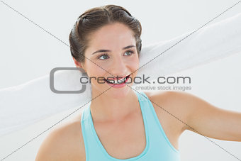 Close up of a happy young woman with towel