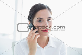 Business woman using mobile phone