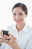 Beautiful young business woman with mobile phone