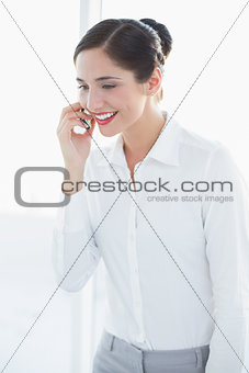 Business woman using mobile phone