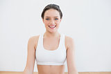 Woman smiling at fitness studio