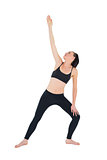 Sporty woman stretching hand over white background