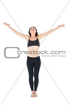 Sporty woman with hands outstretched