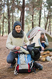 Young couple camping in the wilderness