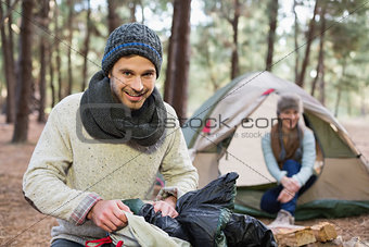 Young couple camping in the wilderness