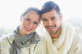 Close up portrait of a loving couple in winter clothing