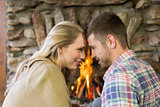 Romantic couple in front of fireplace