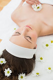 Beautiful woman with eyes closed in beauty salon