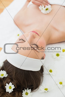 Beautiful woman with eyes closed in beauty salon