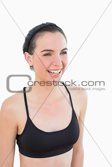 Close up of a sporty young woman smiling