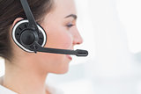 Close up side view of businesswoman wearing headset