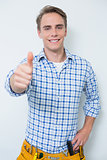 Portrait of a handyman gesturing thumbs up
