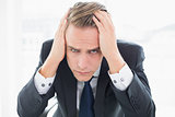 Close up of a worried businessman at office