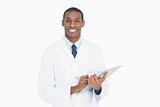 Portrait of a smiling male doctor with clipboard