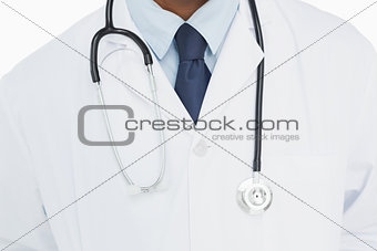 <id section of male doctor in lab coat and with stethoscope