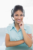 Close up portrait of businesswoman wearing headset