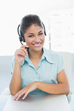 Close up portrait of businesswoman wearing headset