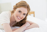 Close up portrait of pretty woman in bed