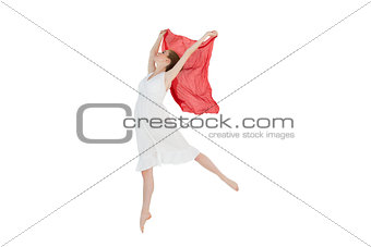 Young beautiful female dancer with red scarf