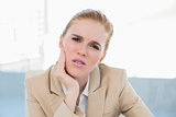 Close up of businesswoman having toothache