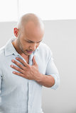 Casual young man with chest pain