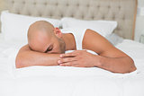 Close up of a man sleeping in bed