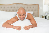 Close up portrait of a man resting in bed