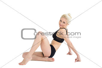 Toned woman relaxing over white background