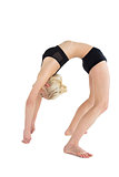 Fit young woman bending backwards
