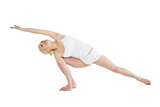 Full length of a sporty young woman practicing yoga