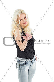 Portrait of happy young casual woman with blonde hair