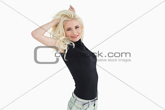 Beautiful casual young blond dancing