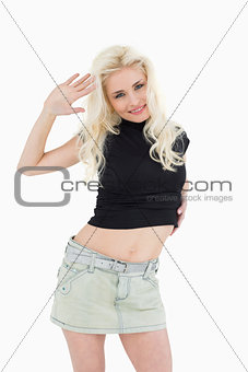 Portrait of a smiling beautiful casual blond posing