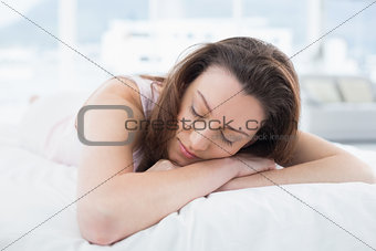 Close up of pretty woman sleeping in bed