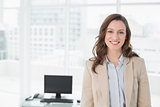 Portrait of an elegant smiling businesswoman in office